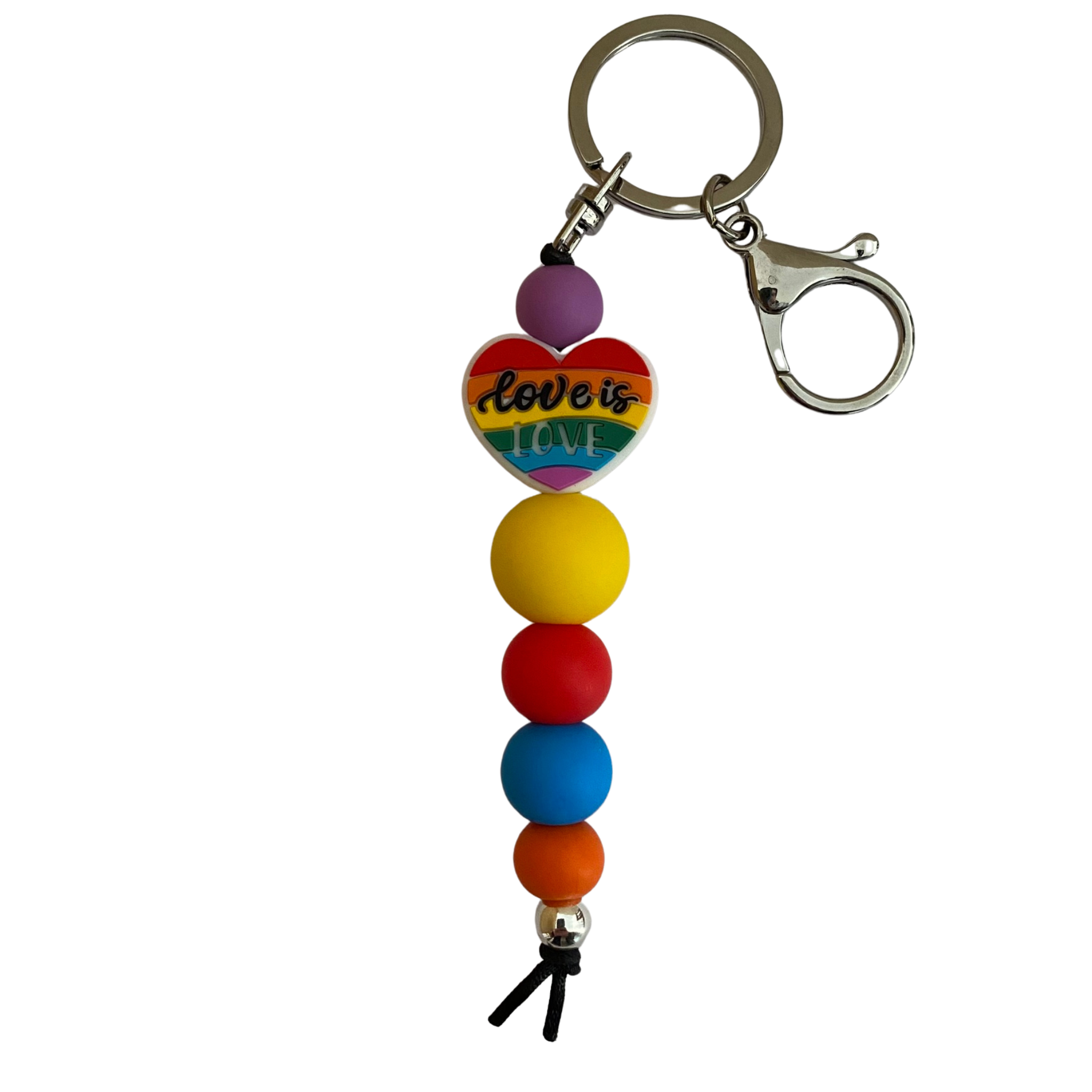 A keyring with a love heart in rainbow colours and the words Love is Love and other round silicone beads.