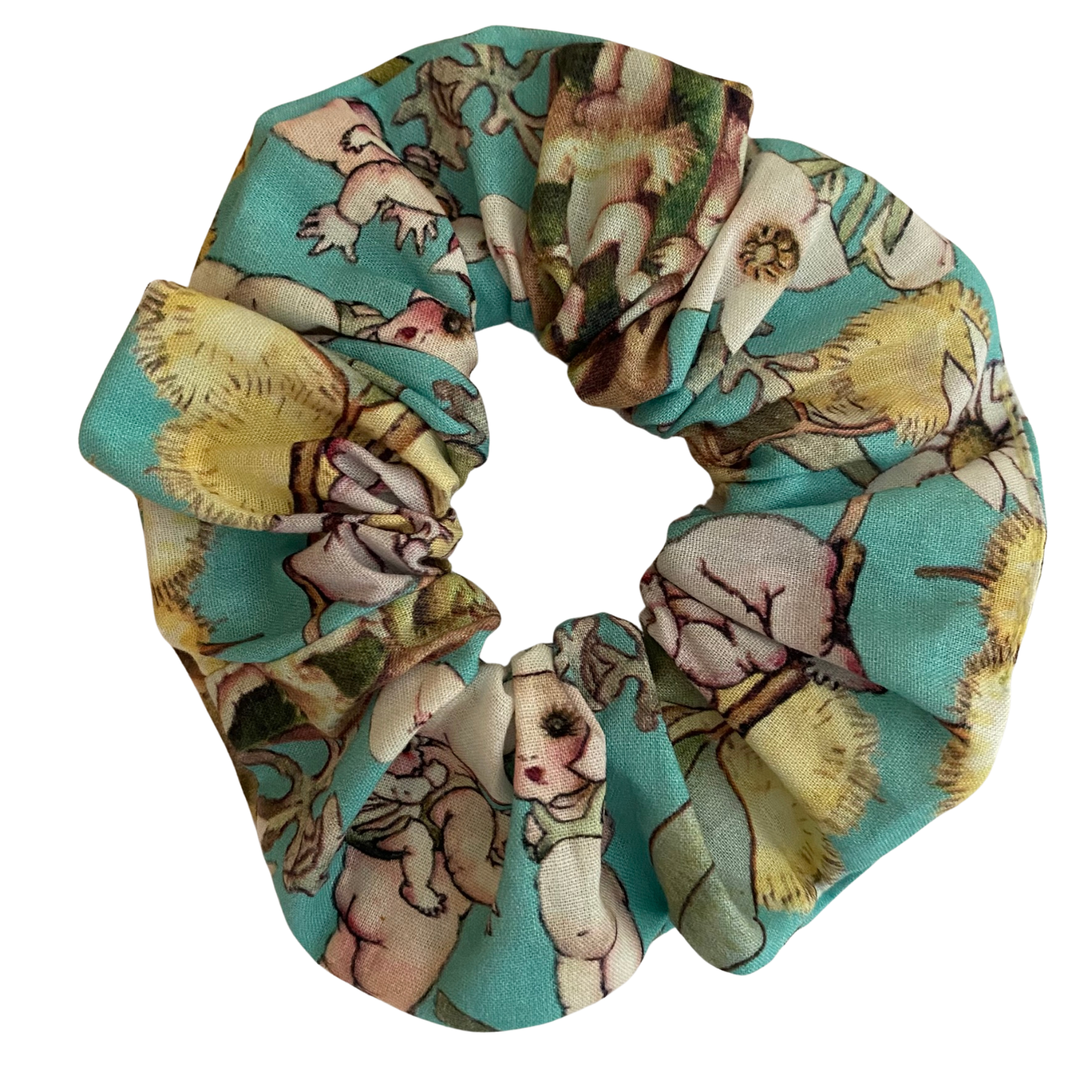 This scrunchie has images of Gumnut Babies by May Gibbs featured on a bright mint fabric.