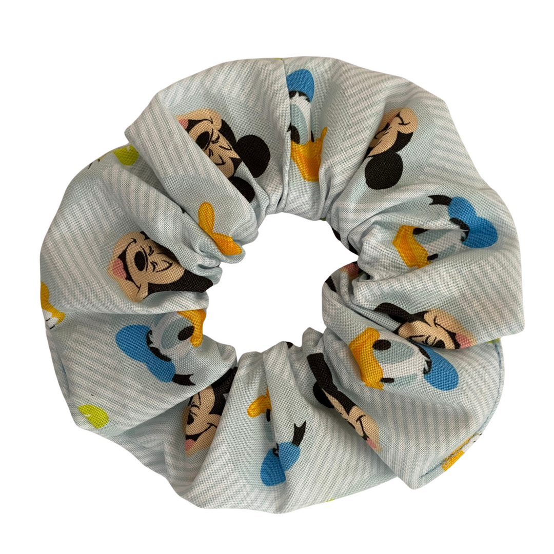 Showcasing charming illustrations of Mickey Mouse and his fun-loving friends—Donald Duck, Goofy, and Pluto featuring durable braided elastic for secure styling.