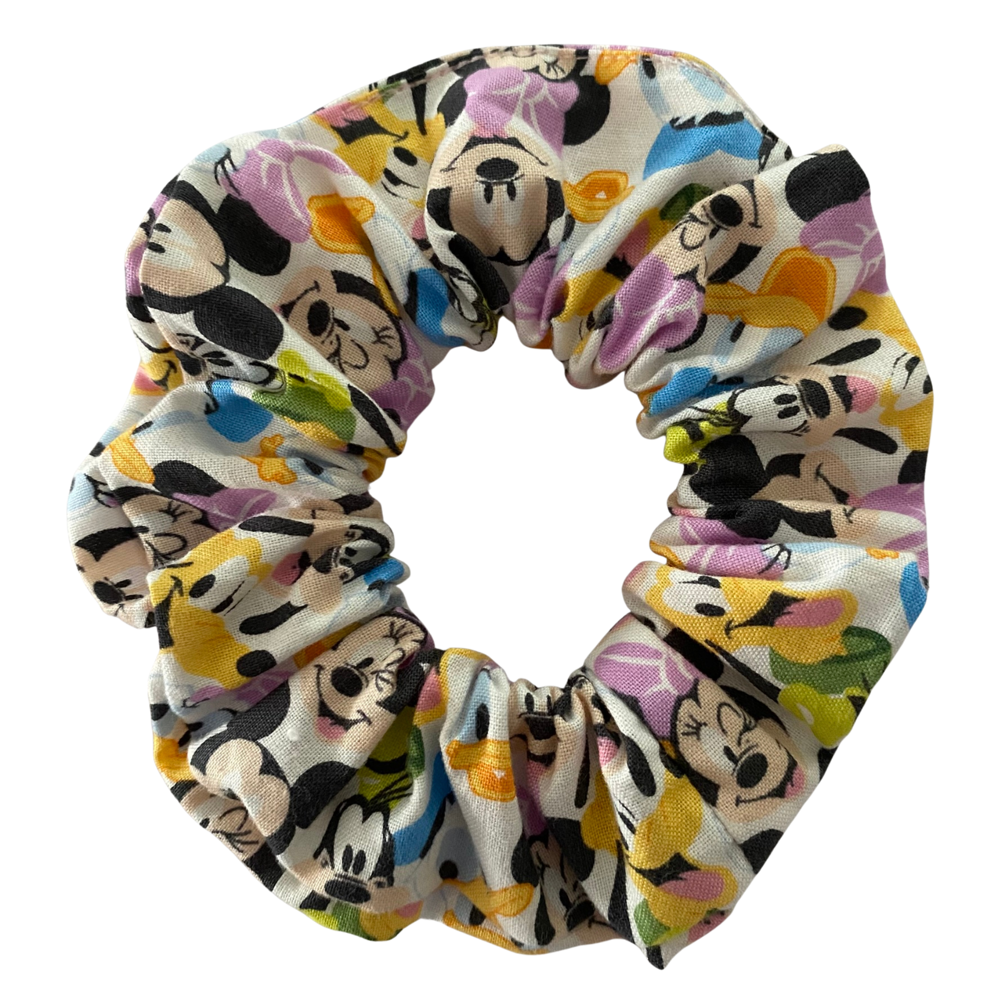 A multicoloured scrunchie with images of Mickey, Minnie, Donald, Daisy and Goofy on a white fabric.
