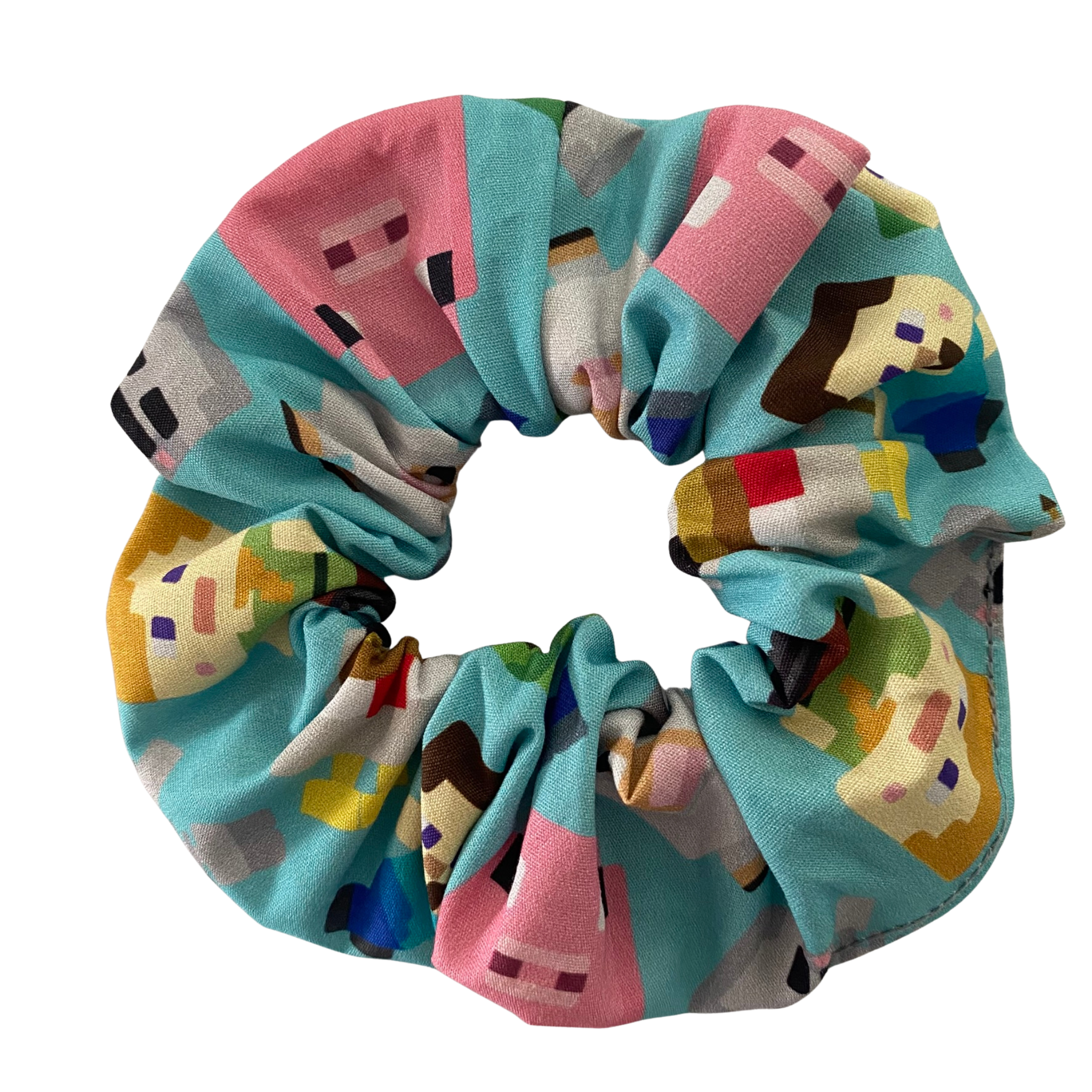 Colourful scrunchie with pixelated character pattern on a white background.