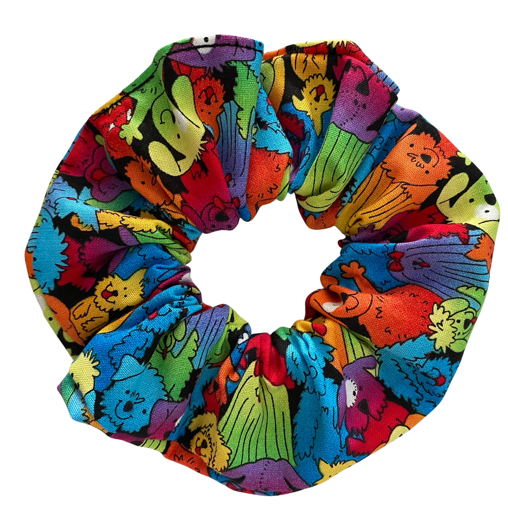 Our Multicolour Dogs Scrunchie is handmade from cotton woven fabric featuring vibrant illustrations of playful pups, and comes in three versatile sizes.