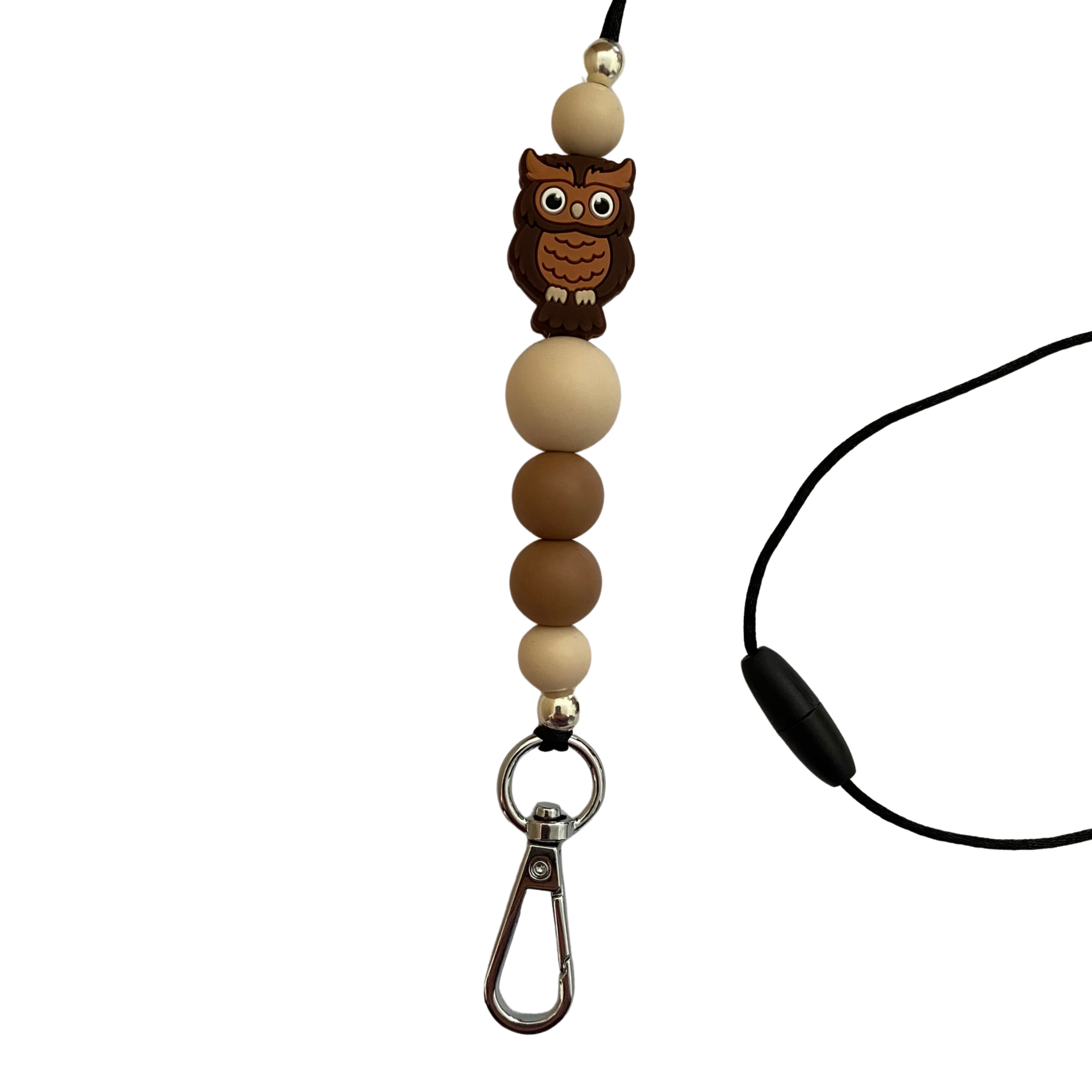 A 60cm lanyard fitted with a safety break away clasp and a owl silicone bead and other coloured round silicone beads.