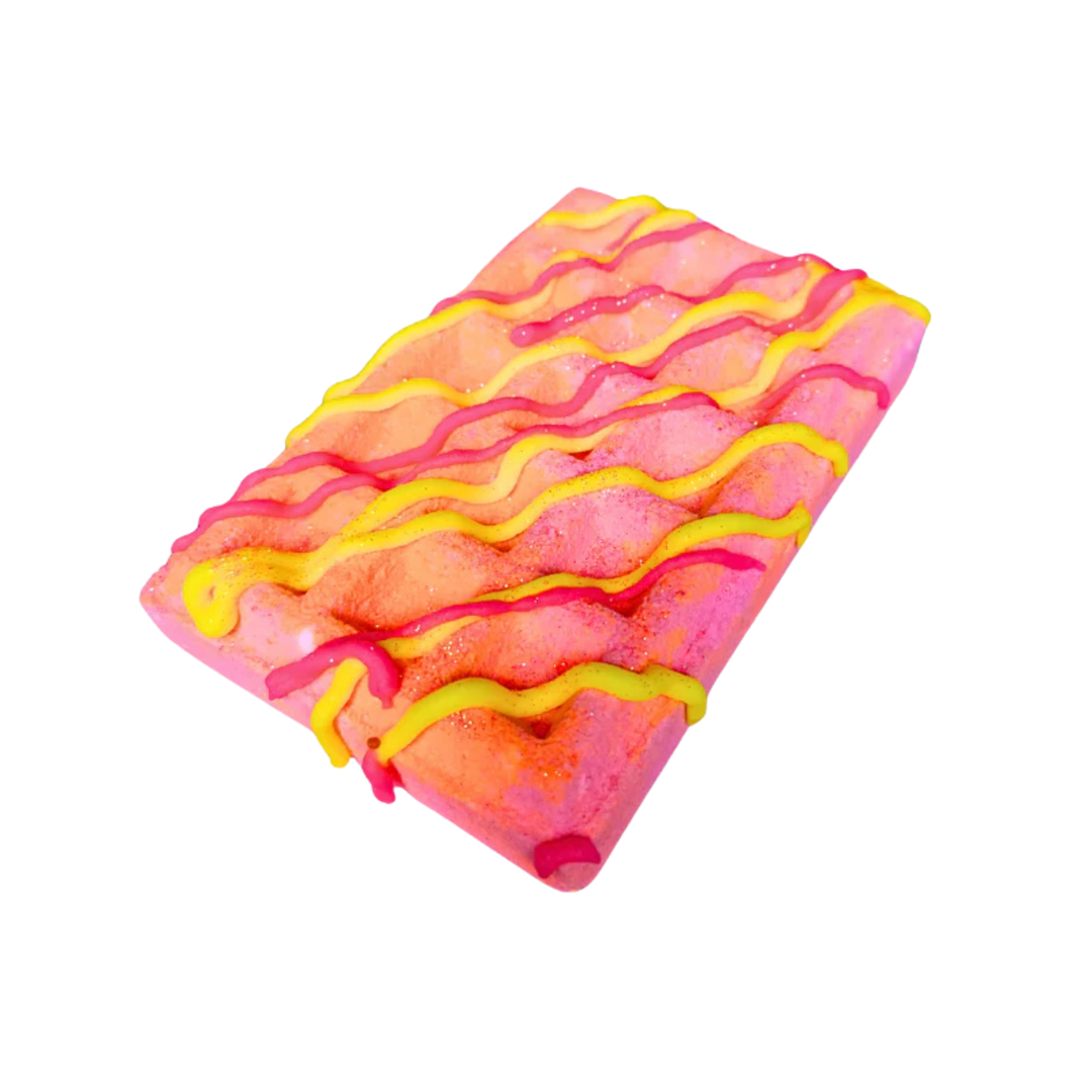 Pink and orange striped waffle shaped bath bomb.