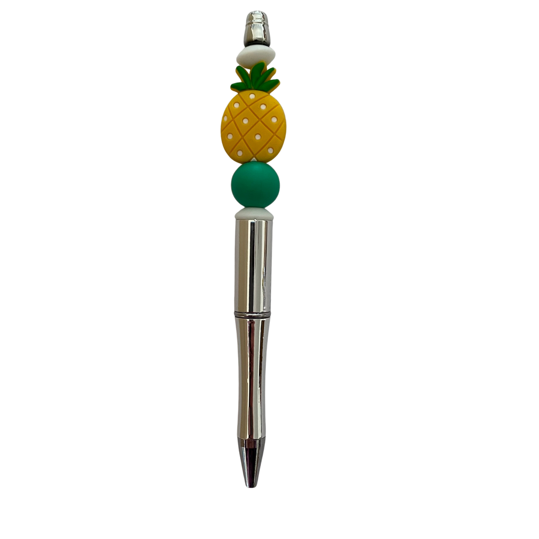 Pineapple-shaped pen on a white background.