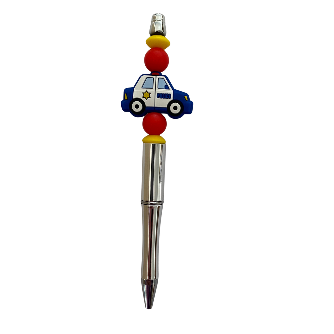 Pen with a police car charm on a white background.