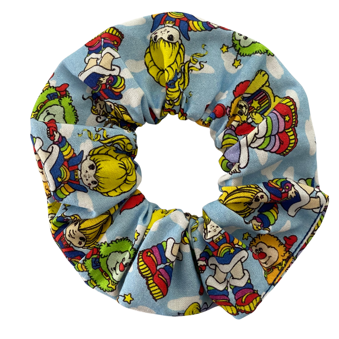 Colourful scrunchie with Rainbow Brite character design on a white background.