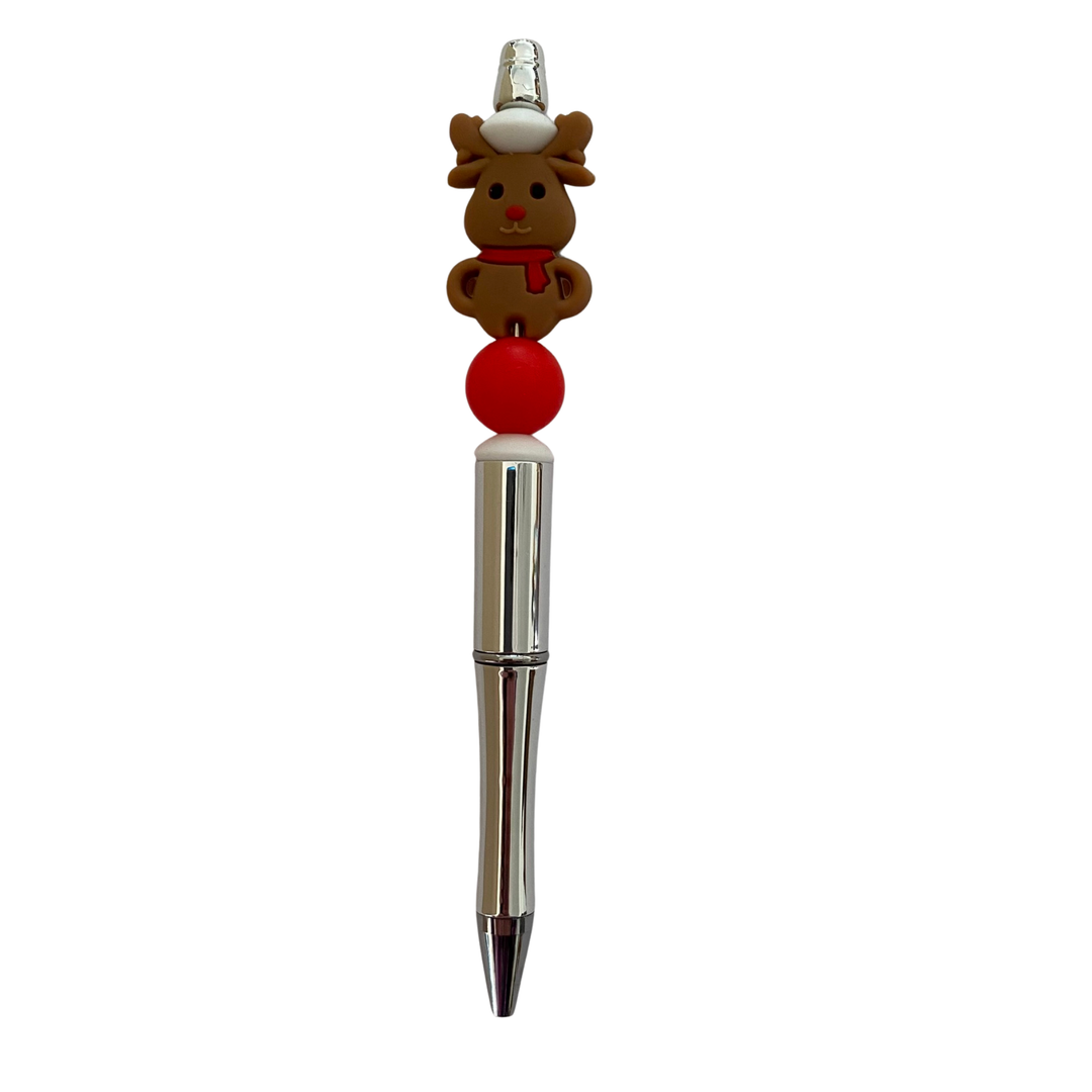 Pen with a reindeer-shaped top on a white background.