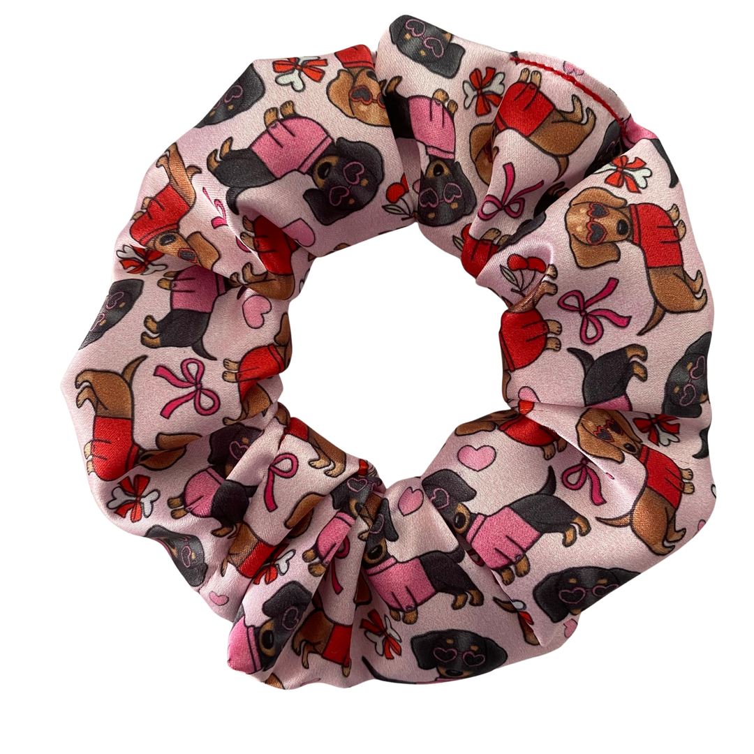 Scrunchie with dog pattern on a white background.