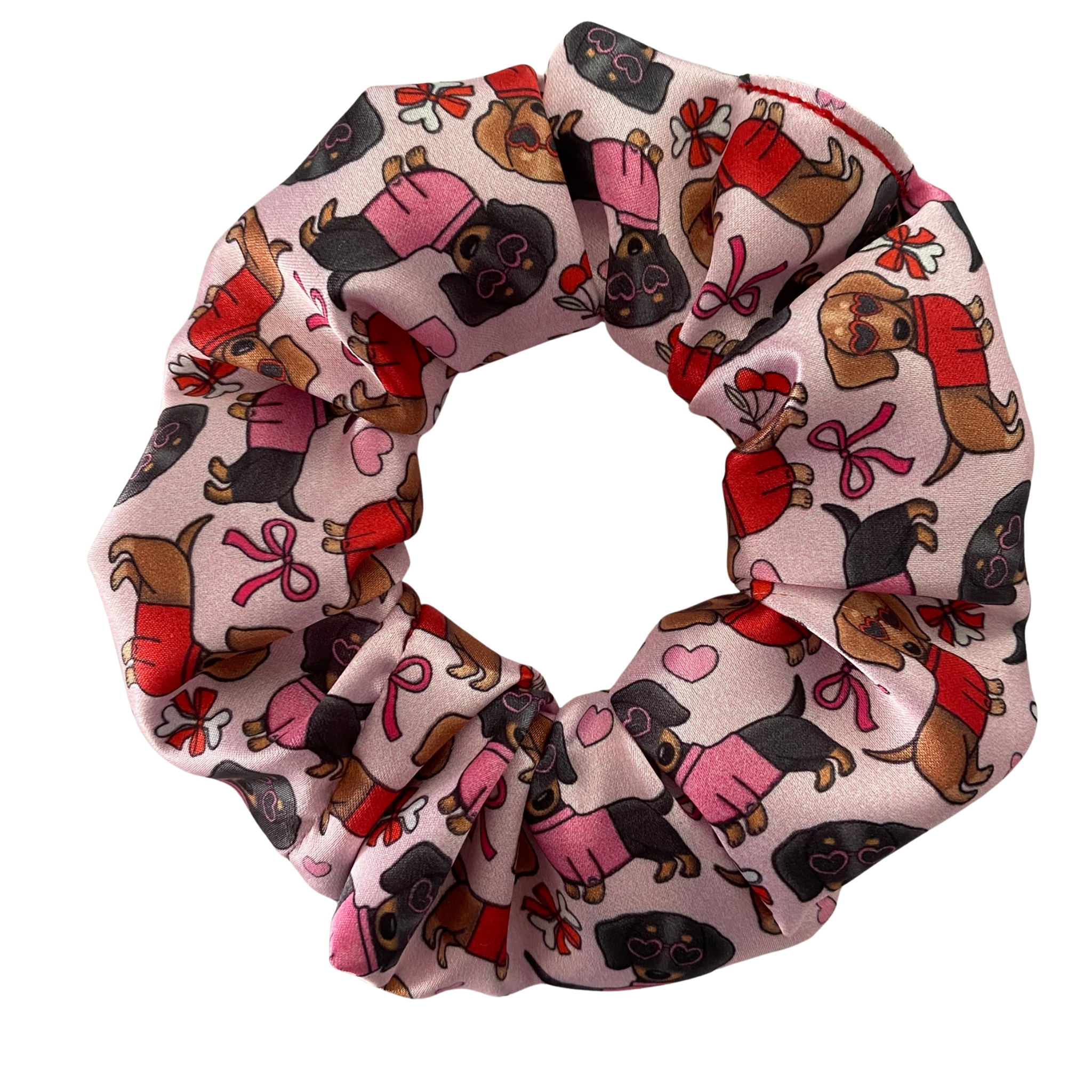 Scrunchie with dog pattern on a white background.