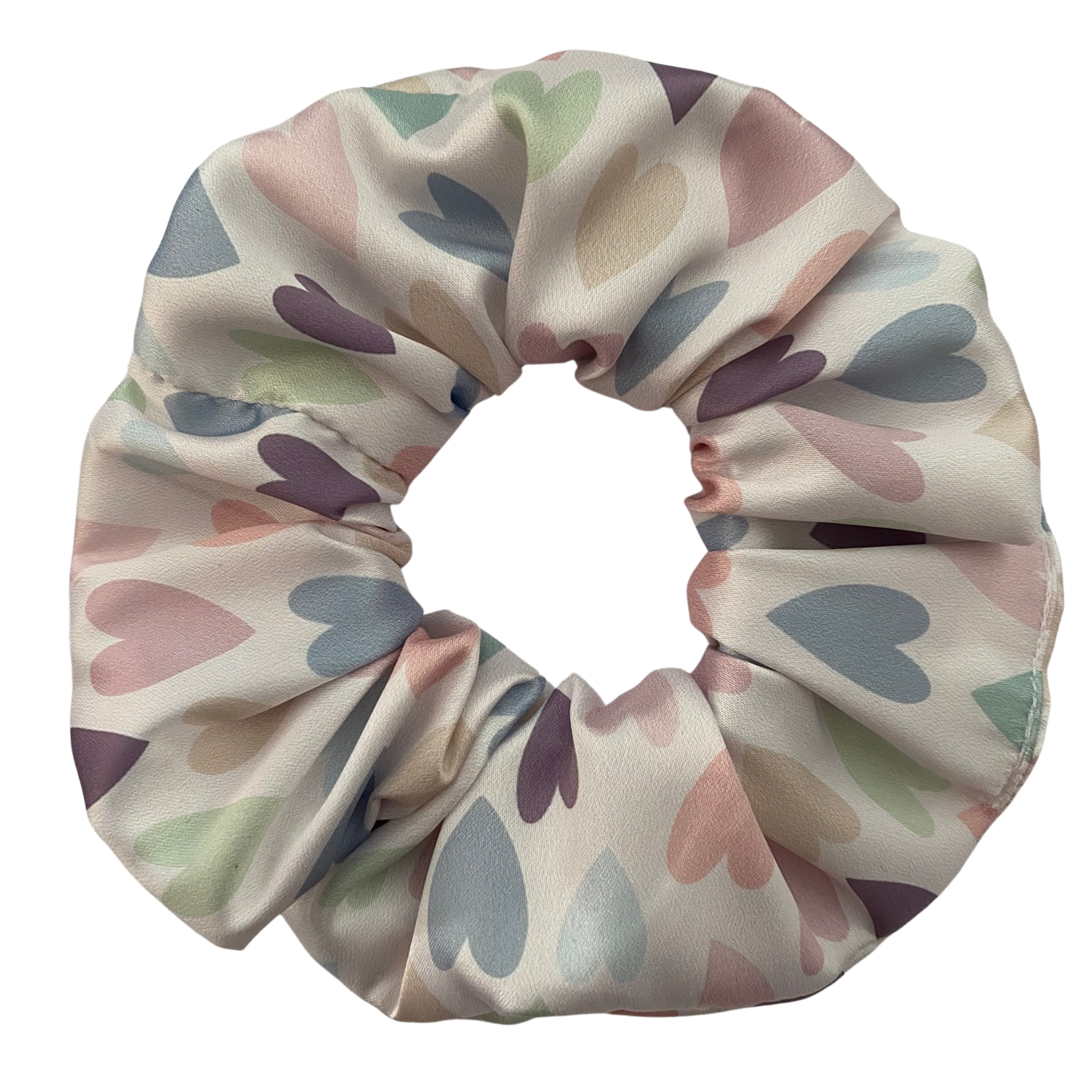 Scandi Hearts Satin Scrunchie. Handmade from soft, shiny stretch satin, this scrunchie features a crisp white base adorned with delicate pastel love hearts.