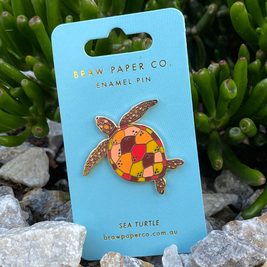 Sea Turtle Enamel Pin, featuring intricate detailing and vibrant colours inspired by these magnificent marine creatures.