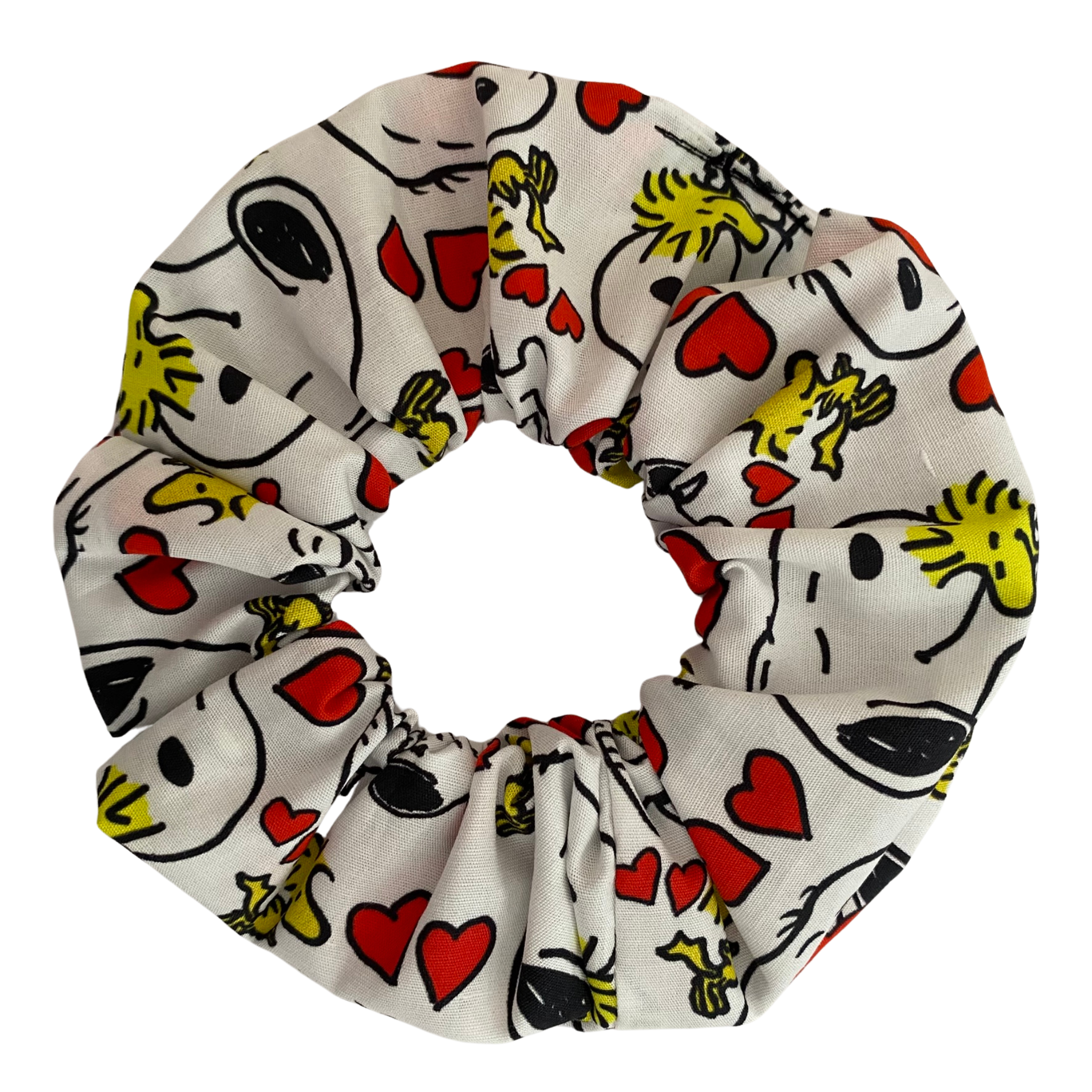 Our Snoopy Love Scrunchies featuring sweet red love hearts alongside playful illustrations of Snoopy and Woodstock on a white fabric.