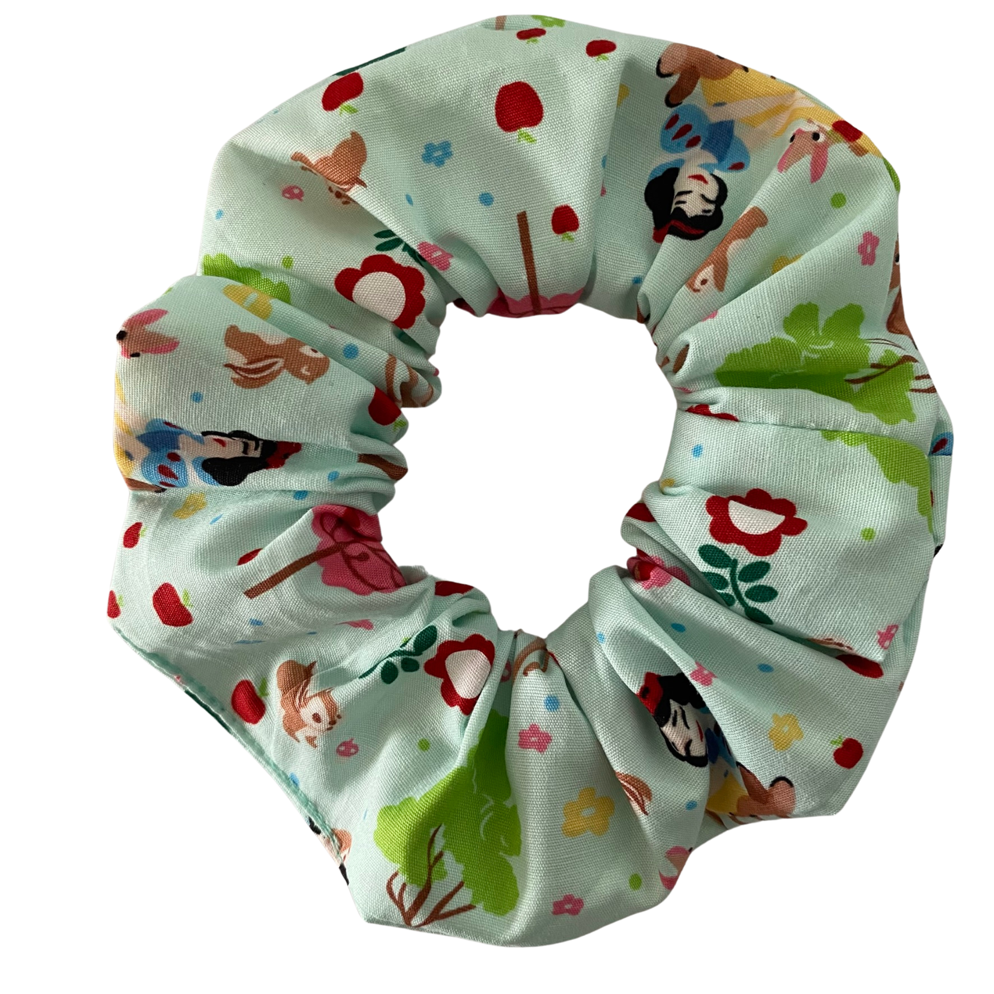 Snow White Scrunchie is handmade from soft cotton poplin and features sweet illustrations of Snow White with her woodland animal friends.