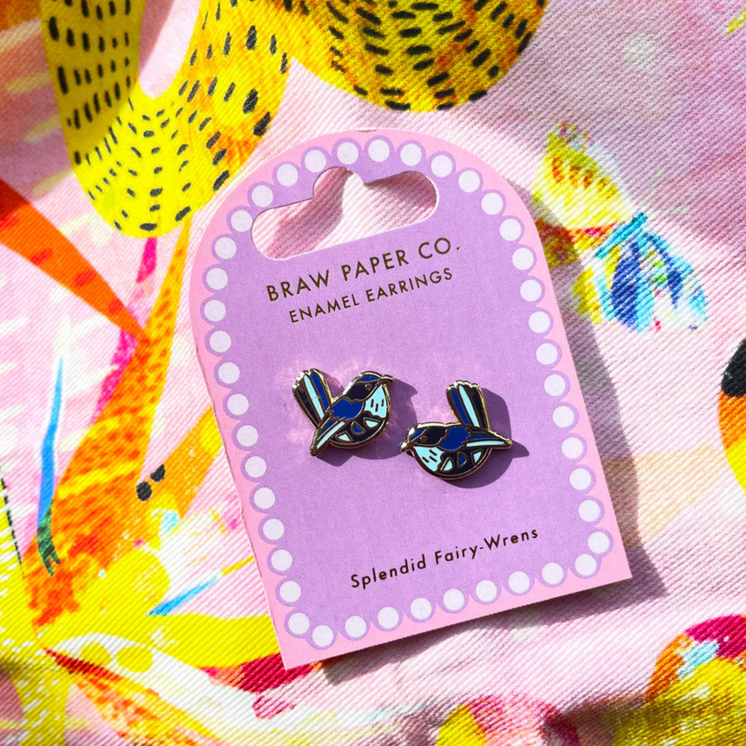 Enamel earrings on a Braw Paper Co. branded card with colorful background.