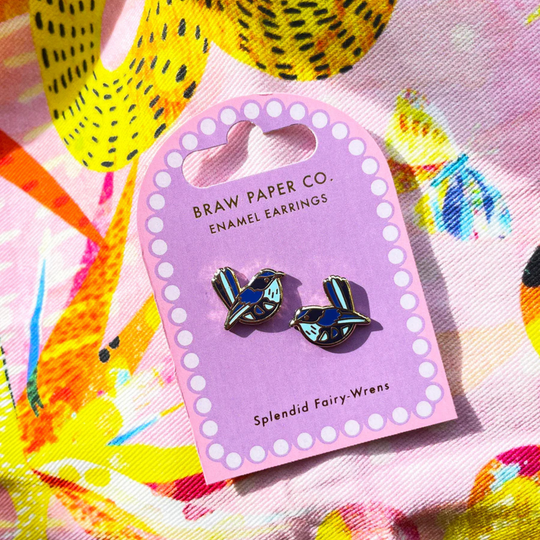 Enamel earrings on a Braw Paper Co. branded card with colorful background.