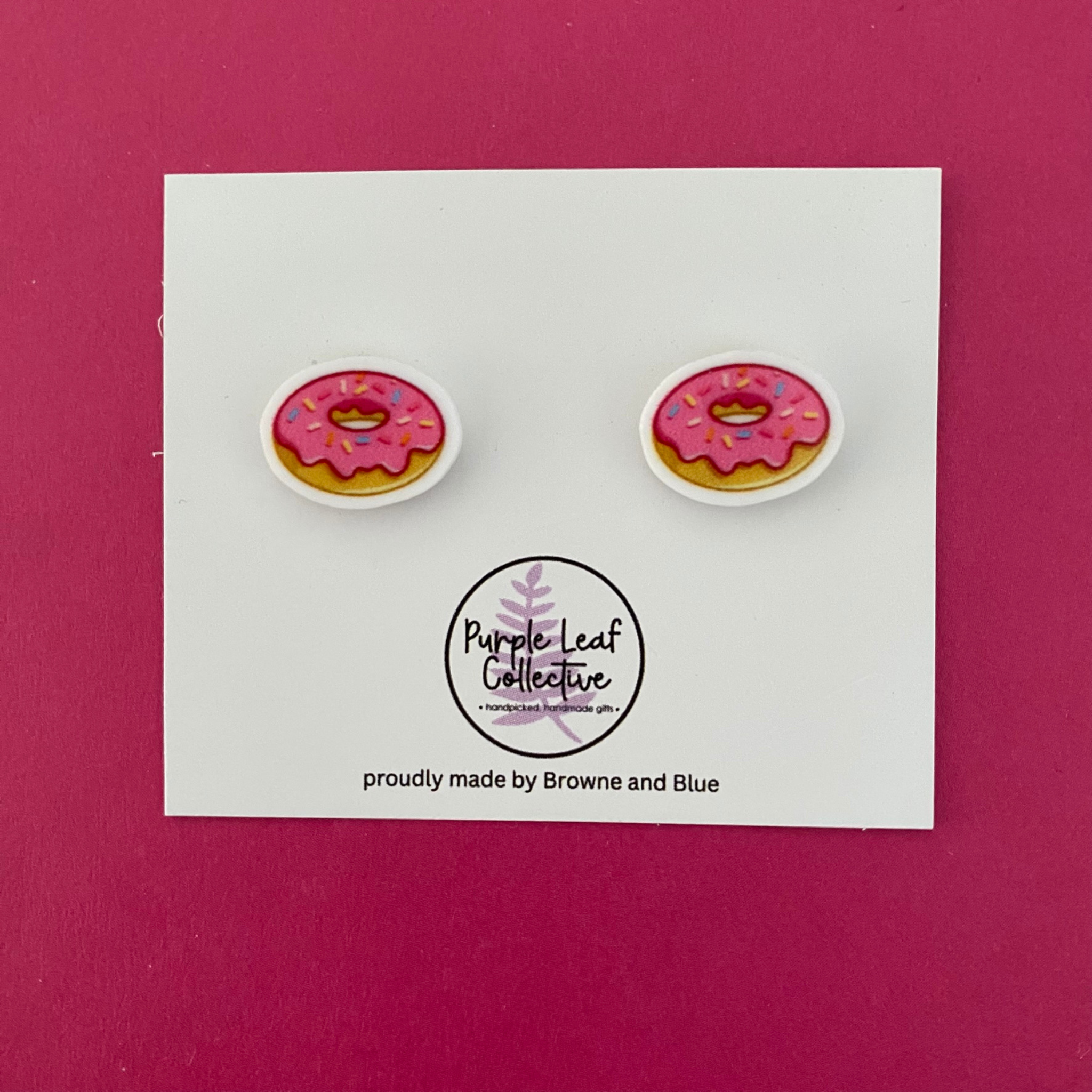 Strawberry donut with sprinkles novelty stud earrings —lightweight and comfortable to wear. Hypoallergic Surgical Steel Posts. Printed Acrylic. Approx 12mm.
