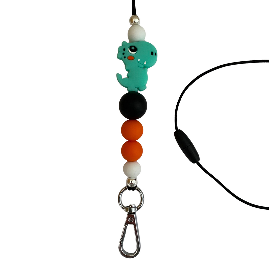 T-Rex Dinosaur lanyard. Total length of lanyard approx 60cm&nbsp;and fitted with a safety break away clasp.