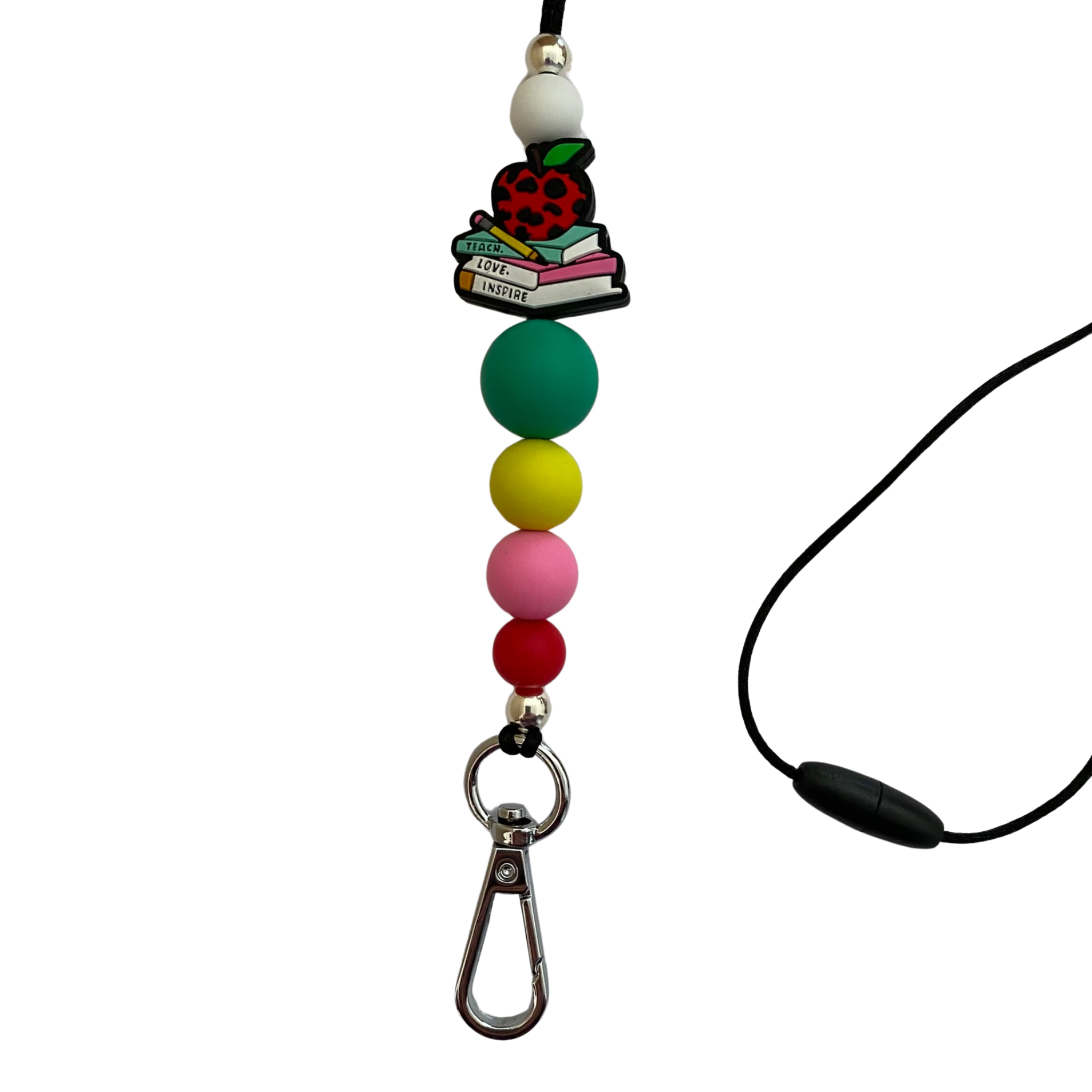 A 60cm lanyard fitted with a safety break away clasp and a Teacher Apple Book Stack silicone bead and other coloured round silicone beads.