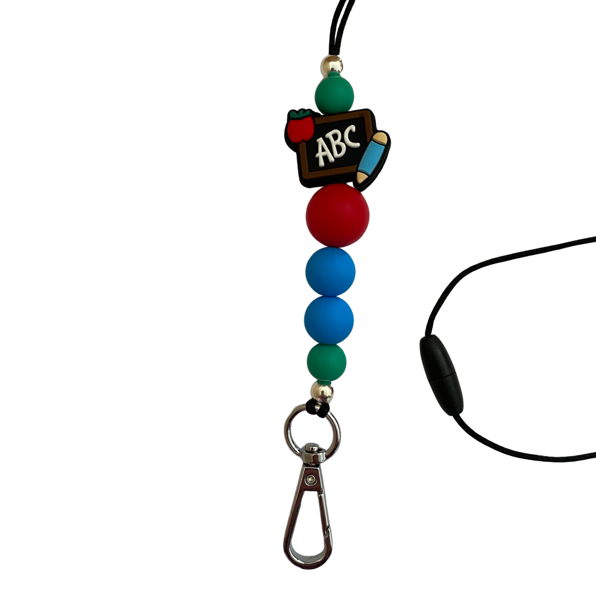 A 60cm lanyard fitted with a safety break away clasp featuring a teacher ABC blackboard silicone bead and other coloured round silicone beads.