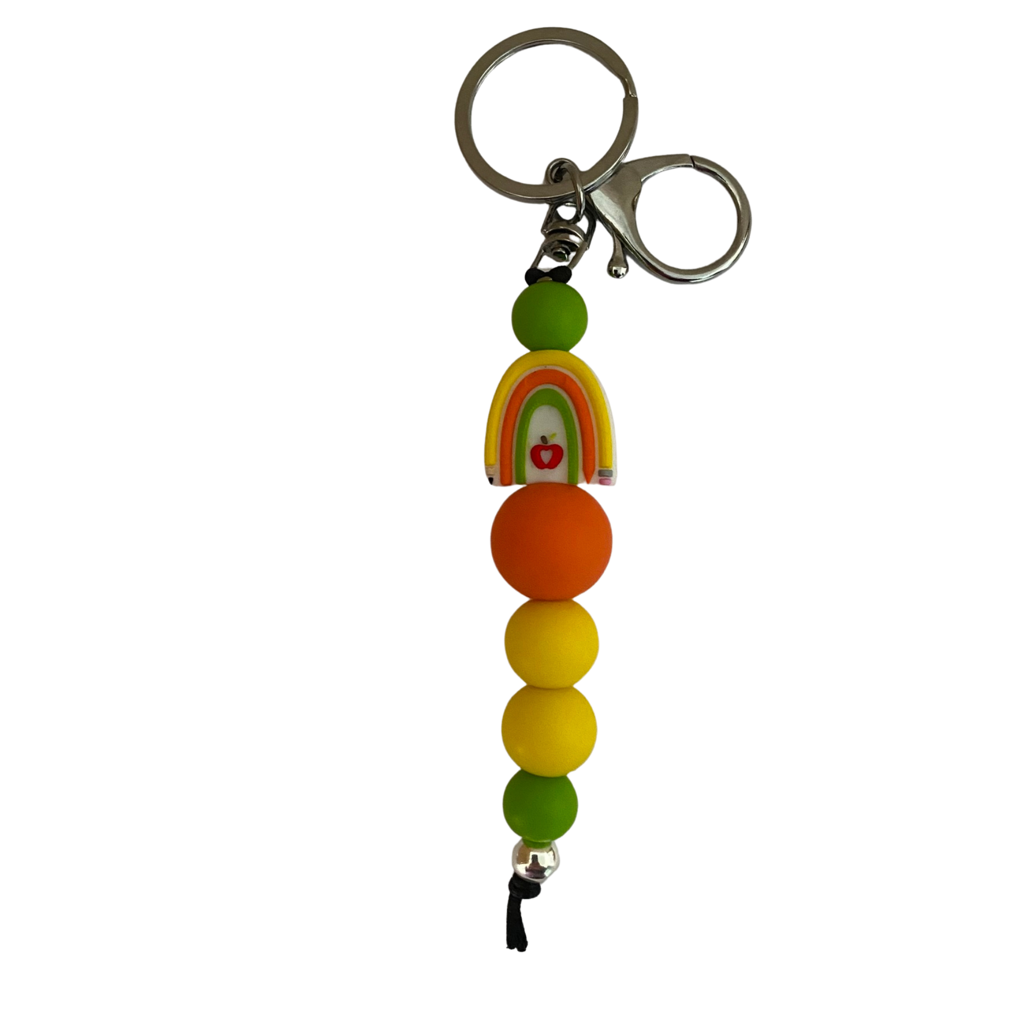 An 18cm keyring featuring a rainbow of pencils and a red apple in the centre and other round coloured silicone beads.