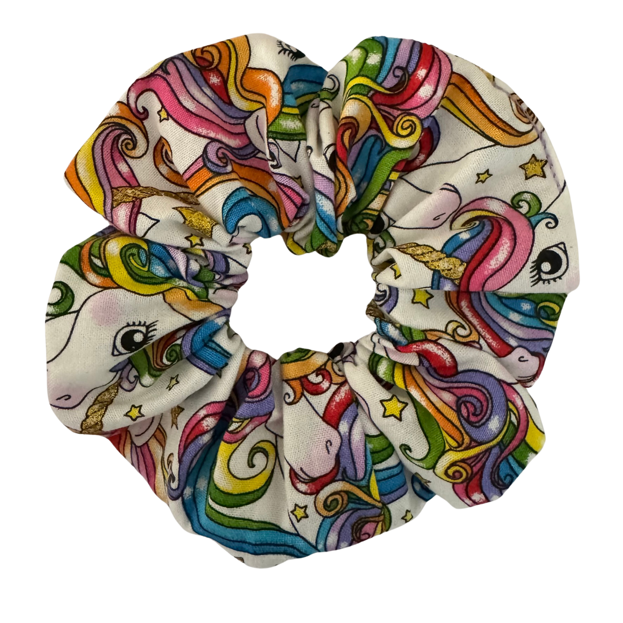 Unicorn heads with gold glitter and rainbow hair on a white fabric.