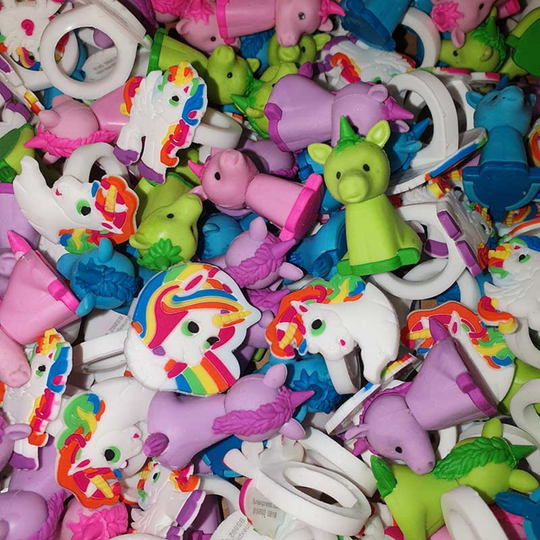 A picture of some of the unicorn toys found inside our Unicorn Toy Bath Bomb.