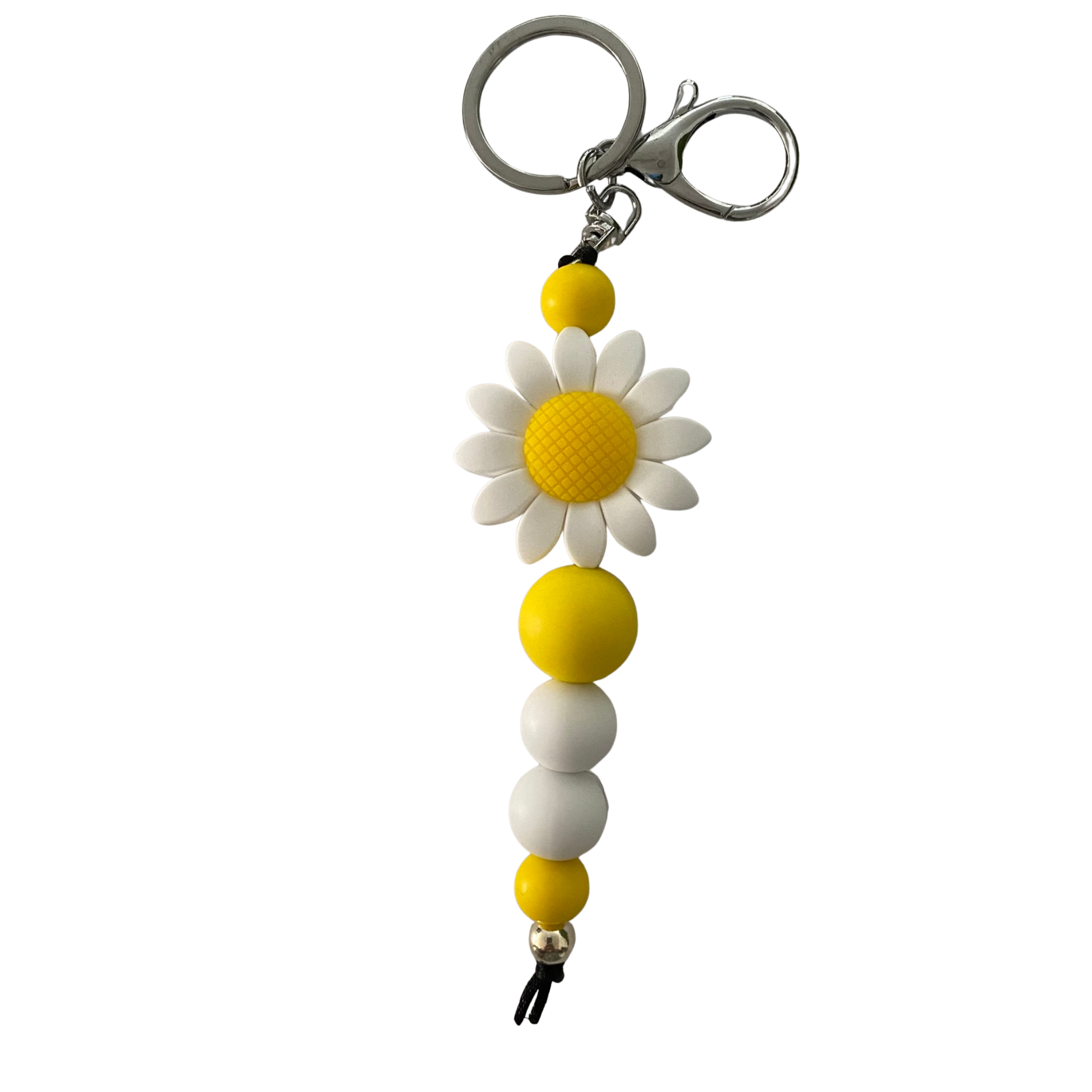Keyring featuring yellow and white silicone beads, a silver aluminium bead, and a white sunflower charm on a black nylon cord.